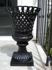Freshly painted urns for the front steps